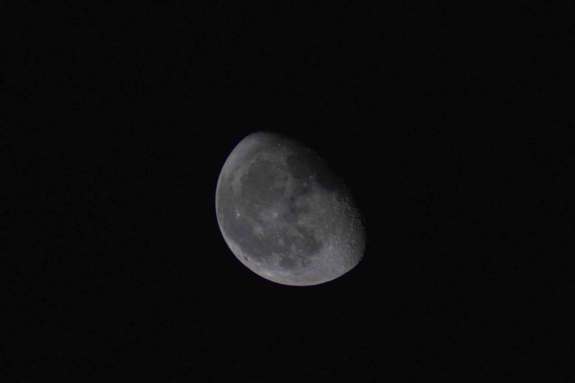 The moon in a black sky